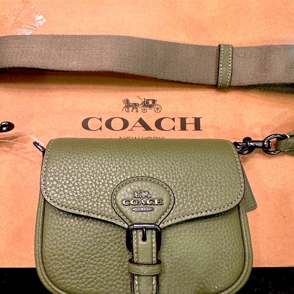 Coach cross body with cloth strap .  Brand new .